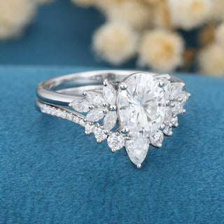 oval-shaped-moissanite-cluster-bridal-set