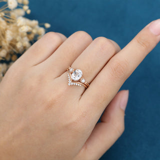 oval-shaped-moissanite-three-stone-bridal-set