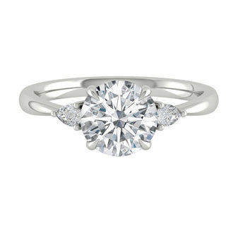 round-cut-three-stone-moissanite-engagement-ring