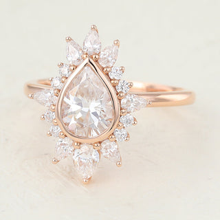 0-57-ct-pear-shaped-moissanite-cluster-halo-engagement-ring