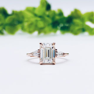 emerald-cut-three-stone-moissanite-engagement-ring