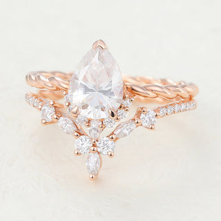 1-0-ct-pear-moissanite-cluster-bridal-ring-set-6