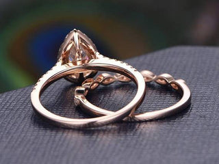 pear-cut-halo-milgrain-style-moissanite-bridal-ring-set