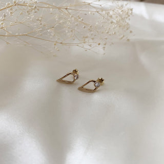 Round Cut Unique Moissanite Diamond Earrings in Yellow Gold